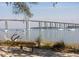 Scenic waterfront view from a bench, featuring a bridge, sailing boats and a pier at 1225 Blakeway St # 403, Charleston, SC 29492