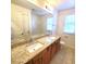 Bathroom with double vanity, granite counters, and tiled floor at 126 Shadybrook Dr, Summerville, SC 29486