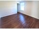 Bright bedroom with wood floors, window, and neutral paint at 126 Shadybrook Dr, Summerville, SC 29486