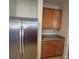Kitchen details include a modern stainless steel refrigerator and wooden cabinets with granite counters at 126 Shadybrook Dr, Summerville, SC 29486