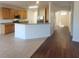 Bright open-concept kitchen with stainless steel appliances, granite countertops and island at 126 Shadybrook Dr, Summerville, SC 29486