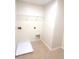 Functional laundry room with shelving and utility connections at 126 Shadybrook Dr, Summerville, SC 29486