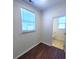 Wood-look flooring in this room with a bright window and open access to the next room at 126 Shadybrook Dr, Summerville, SC 29486