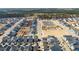 Aerial view showcases a home's location within a neighborhood, highlighting nearby community amenities and surroundings at 127 Country Gate Ln, Summerville, SC 29485