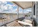 Balcony offers scenic neighborhood views, wood floors, and comfortable seating at 127 Country Gate Ln, Summerville, SC 29485