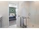 Bathroom showcases shower with glass door, view into bedroom with sage green walls at 127 Country Gate Ln, Summerville, SC 29485