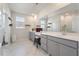 Bright bathroom featuring double vanity with a large mirror and a shower with glass doors at 127 Country Gate Ln, Summerville, SC 29485