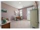 Bedroom with lilac walls, carpeted flooring, and a vintage table and chairs at 127 Country Gate Ln, Summerville, SC 29485