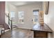 Inviting entryway with wood floors, natural light, and a staircase leading to the upper level at 127 Country Gate Ln, Summerville, SC 29485