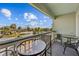 Inviting balcony with patio furniture, perfect for relaxing outdoors at 1300 Ocean Blvd # 238, Isle of Palms, SC 29451