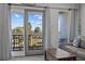 Balcony view featuring seating, green grass, and palm trees at 1300 Ocean Blvd # 238, Isle of Palms, SC 29451