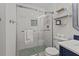 Bathroom featuring glass shower with tile detail, modern fixtures and decorative mirror at 1300 Ocean Blvd # 238, Isle of Palms, SC 29451