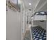 Hallway view of bunk beds with under bed storage and easy access ladder at 1300 Ocean Blvd # 238, Isle of Palms, SC 29451