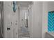 Hallway with multiple access doors and modern flooring at 1300 Ocean Blvd # 238, Isle of Palms, SC 29451