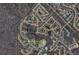 Aerial view of community with neighborhood streets and proximity to a recreational center with tennis courts at 1346 Ashley Gardens Blvd, Charleston, SC 29414