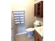 Compact bathroom features a toilet, vanity, and cabinet for storage at 1346 Ashley Gardens Blvd, Charleston, SC 29414