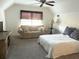 Bright bedroom with a comfortable sofa, bed, ceiling fan, and ample natural light at 1346 Ashley Gardens Blvd, Charleston, SC 29414