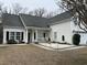Charming single story home with white siding, black shutters and manicured lawn at 1346 Ashley Gardens Blvd, Charleston, SC 29414