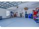 Spacious three car garage with ample room for storage and a painted floor at 1346 Ashley Gardens Blvd, Charleston, SC 29414