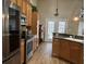 Modern kitchen with stainless steel appliances, wood cabinets, and stone countertops at 1346 Ashley Gardens Blvd, Charleston, SC 29414
