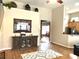 Comfortable living room featuring hardwood floors and an open layout to dining and kitchen at 1346 Ashley Gardens Blvd, Charleston, SC 29414