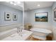 Elegant bathroom with a soaking tub and marble countertops at 1346/48 Pelican Watch, Seabrook Island, SC 29455