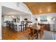 Bright modern kitchen with stainless steel appliances, large island, and adjacent dining area at 1346/48 Pelican Watch, Seabrook Island, SC 29455