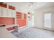 Spacious bedroom with custom built-ins, a desk, and a large window offering plenty of natural light at 1401 Ocean Club Dr, Isle of Palms, SC 29451