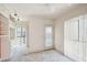 Bedroom featuring custom built-ins, neutral carpet, and direct access to a balcony for outdoor enjoyment at 1401 Ocean Club Dr, Isle of Palms, SC 29451
