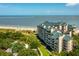 Beautiful oceanfront condos offering lush landscaping, beach access, and stunning views of the coast at 1401 Ocean Club Dr, Isle of Palms, SC 29451