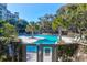 The Ocean Club's luxurious pool offers a refreshing space to unwind and socialize with guests at 1401 Ocean Club Dr, Isle of Palms, SC 29451