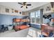 Charming bedroom with wood-accented bunkbeds, blue wainscoting and natural light at 147 Moon Dance Ln, Summerville, SC 29483
