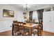 Traditional dining room with hardwood floors, wood table, and decorative lighting at 147 Moon Dance Ln, Summerville, SC 29483
