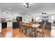 Open concept dining room with hardwood floors adjacent to the updated kitchen and living room at 147 Moon Dance Ln, Summerville, SC 29483