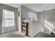 Upstairs hallway with carpeted floors, a window, and a small bookshelf at 147 Moon Dance Ln, Summerville, SC 29483