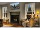 Relaxing living room with fireplace, comfortable seating and a serene ambiance at 147 Moon Dance Ln, Summerville, SC 29483