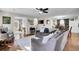 Open-concept living room with access to multiple rooms and ample natural light at 147 Moon Dance Ln, Summerville, SC 29483