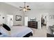 Bright main bedroom featuring vaulted ceilings, neutral walls, and a modern ceiling fan at 147 Moon Dance Ln, Summerville, SC 29483