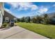 Expansive backyard features lush green lawn and mature landscaping, perfect for outdoor enjoyment at 2014 Barn Swallow Rd, Summerville, SC 29483