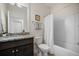 Well-lit bathroom features granite countertop, undermount sink, framed mirror and a shower-tub combo at 2014 Barn Swallow Rd, Summerville, SC 29483