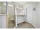 Bathroom with a frameless glass shower, a built-in bench, and a vanity with granite counters and brushed nickel fixtures at 2014 Barn Swallow Rd, Summerville, SC 29483