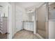 Beautiful bathroom featuring frameless shower, and a vanity with granite counters and brushed nickel fixtures at 2014 Barn Swallow Rd, Summerville, SC 29483