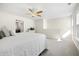 Spacious bedroom with ceiling fan, carpet, neutral walls, and ensuite bathroom at 2014 Barn Swallow Rd, Summerville, SC 29483