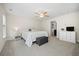 Spacious bedroom with ceiling fan, carpet, neutral walls, and ensuite bathroom at 2014 Barn Swallow Rd, Summerville, SC 29483