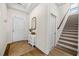 Bright foyer with hardwood floors and staircase at 2014 Barn Swallow Rd, Summerville, SC 29483