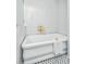 Traditional white bathtub with bronze fixtures and classic white subway tile at 207 S Gum St, Summerville, SC 29483