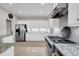 Modern kitchen featuring stainless steel appliances and granite countertops at 2124 Tall Grass Cir, Mount Pleasant, SC 29466