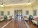Inviting lobby featuring elegant seating, hardwood floors, and decorative artwork at 2124 Tall Grass Cir, Mount Pleasant, SC 29466