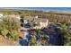 Aerial view of a coastal home nestled among lush greenery, offering privacy and serenity at 2238 Catesbys Blf, Seabrook Island, SC 29455