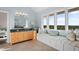 Light and bright bathroom with an oversized window and built-in seat at 2238 Catesbys Blf, Seabrook Island, SC 29455